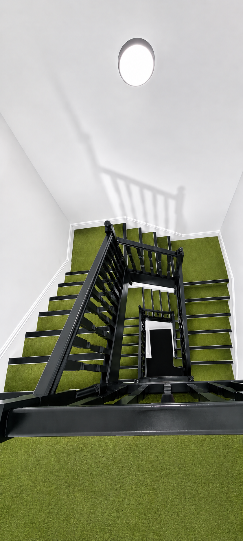 Green & Olive staircase with olive green carpet